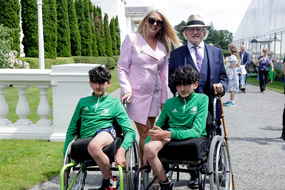 Angie Benhaffaf with her twin sons Hussein and Hassan met with President President Michael D Higgins at Áras an Uachtaráin and they will travel to the Disabled Sports England Games this week. Photo: Maxwell