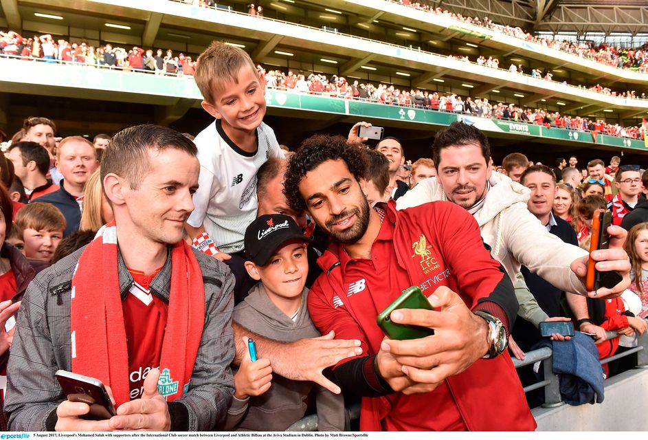 Liverpool's Mohamed Salah with supporters