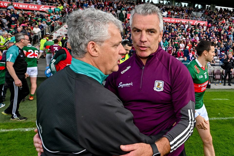 Galway manager Pádraic Joyce (right) and Mayo manager Kevin McStay will have contrasting fortunes after Sunday's Connacht SFC final.
