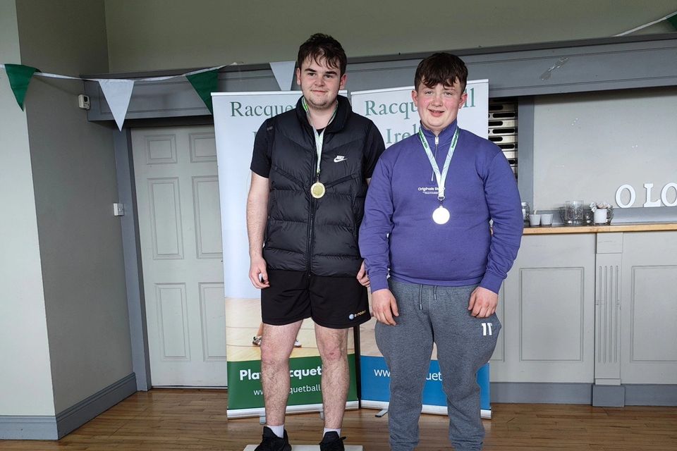 Arklow Racquetball Club's Joseph Farrell who won the novice plate title with runner-up Charlie White from Araglin.