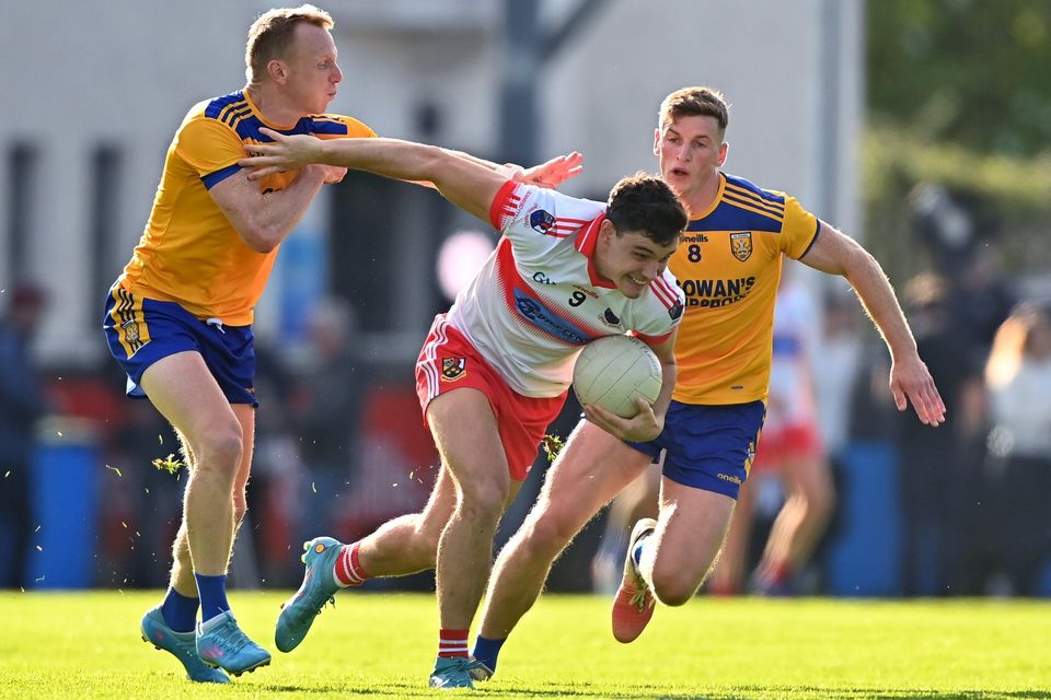 Whitehall Colmcille's Eoghan O'Donnell in action against Paddy Quinn (left) and Micheal Day of Na Fianna during the Dublin SFC at Parnell Park in 2022. Photo: Ben McShane/Sportsfile