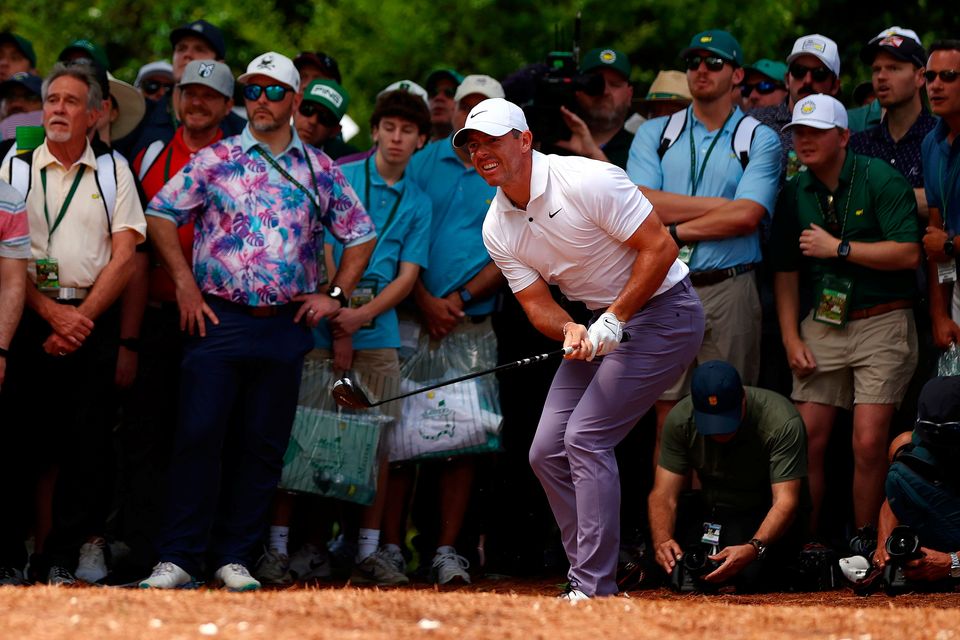 Rory McIlroy plays a shot from the pine straw on the second hole during the first round of the 2024 Masters. Photo: Getty Images