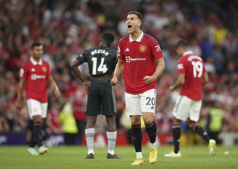 Diogo Dalot celebrated Manchester United’s fourth straight win (Dave Thompson/AP/PA)