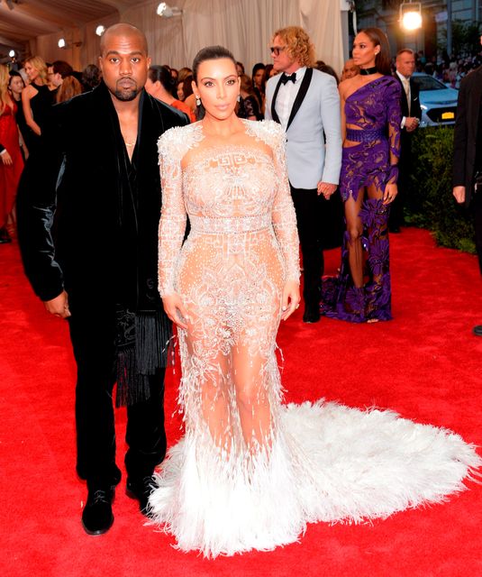 Kanye West, left, and Kim Kardashian arrive at The Metropolitan Museum of Art's Costume Institute benefit gala celebrating "China: Through the Looking Glass" on Monday, May 4, 2015, in New York. (Photo by Evan Agostini/Invision/AP)