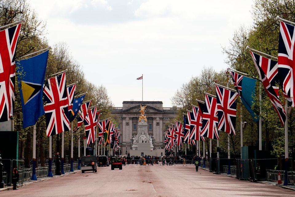 Union flags hang outside Buckingham Palace ahead of the coronation of King Charles III. Photo: Jordan Pettitt/PA