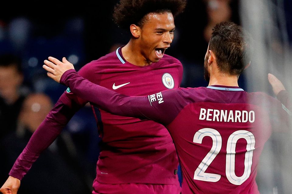 Manchester City's Leroy Sane celebrates scoring their second goal