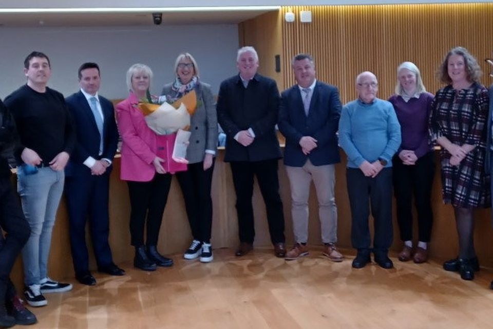 Retiring District Manager Angela Laffan with councillors and officials on her final day in the job.