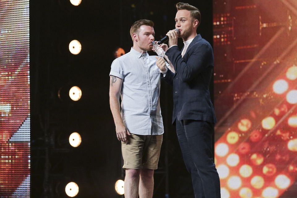 Jon Goody with presenter Olly Murs during the audition stage for the ITV1 talent show, The X Factor (Syco/Thames TV)