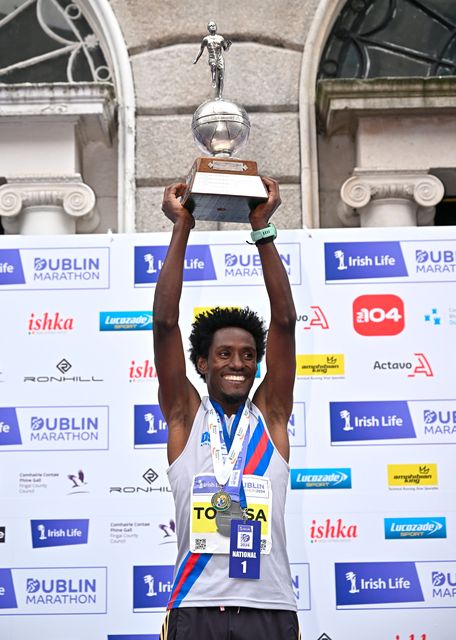 Hiko Tonosa celebrates after winning the Irish National Marathon Championship during the 2024 Irish Life Dublin Marathon. Photo: Sam Barnes/Sportsfile