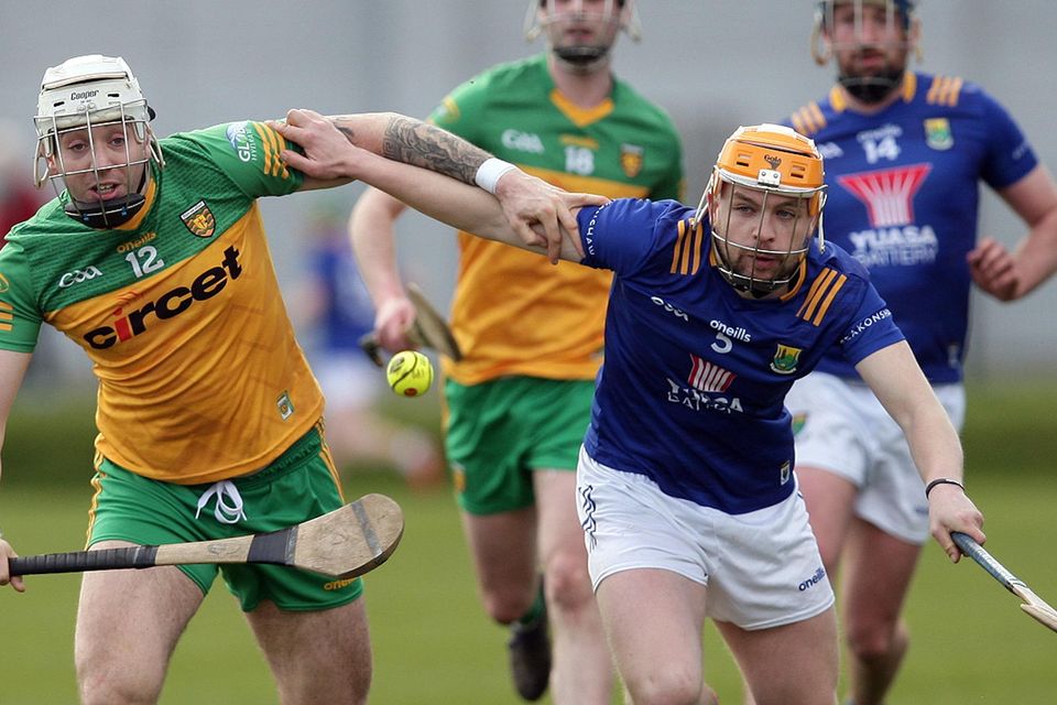 Wicklow's Pádraig Doran and Donegal's Sean Ward race for a breaking ball.