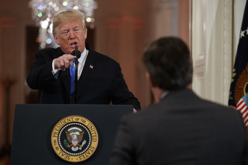 President Donald Trump speaks to CNN journalist Jim Acosta during a news conference in the East Room of the White House (Evan Vucci/AP)