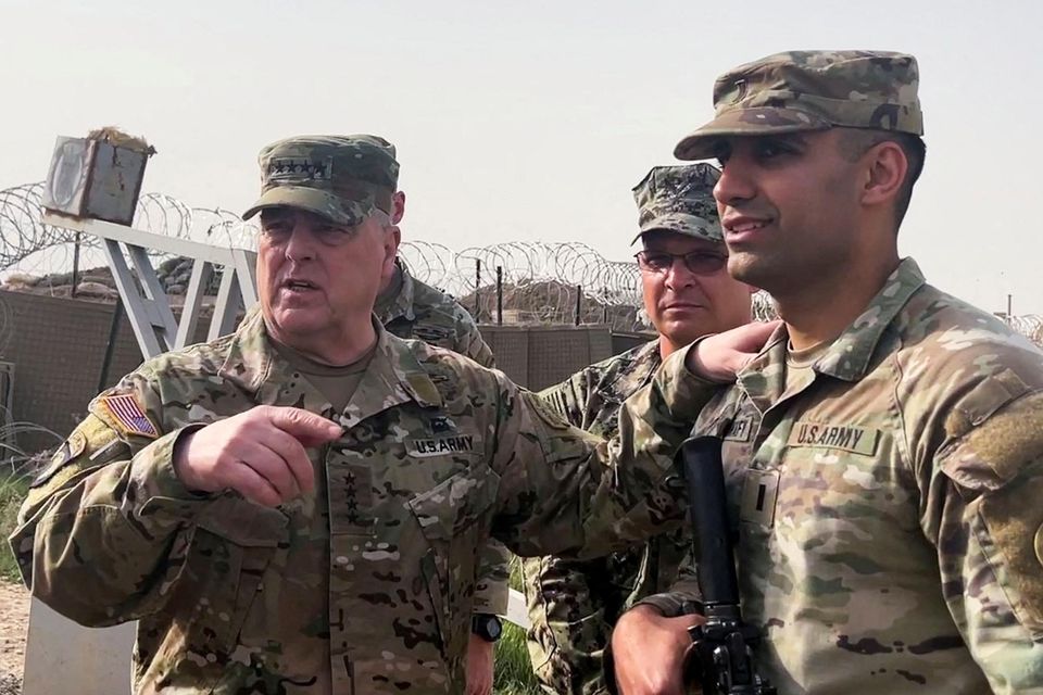 FILE PHOTO: US Joint Chiefs Chair Army General Mark Milley speaks with forces at a US military base in Northeast Syria. Photo: REUTERS/Phil Stewart.