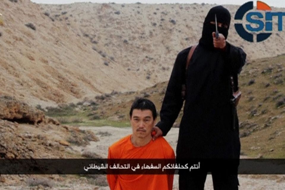 Islamic State militants said they had beheaded a second Japanese hostage,Goto, prompting Prime Minister Shinzo Abe to vow to step up humanitarian aid to the group's opponents in the Middle East and help bring his killers to justice. Japanese Defense Minister Gen Nakatani said the video appeared to be genuine (REUTERS/Site Intel Group via Reuters TV)