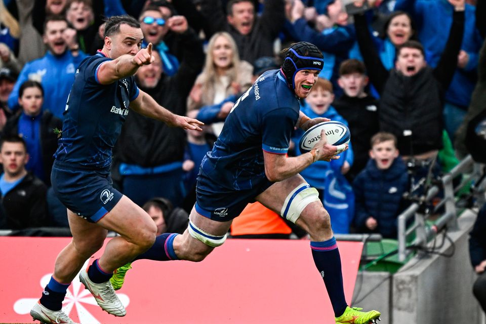 Leinster's Ryan Baird on his way to scoring a try in front of team-mate James Lowe during last Saturday's Champions Cup quarter-final win over La Rochelle at Aviva Stadium. Photo: Sportsfile