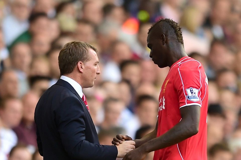 Liverpool boss Brendan Rodgers, left, has no concerns over Mario Balotelli, right