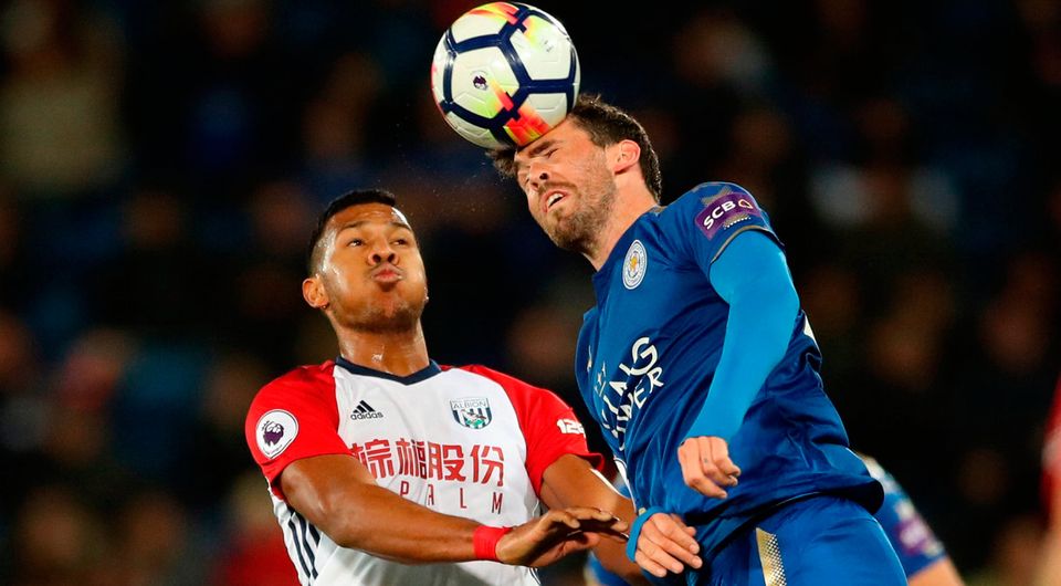 West Bromwich Albion's Salomon Rondon and Leicester City's Christian Fuchs battle for the ball. Photo credit: Nick Potts/PA Wire