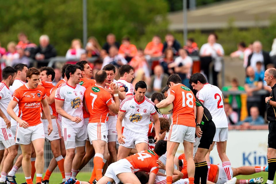 Players from both sides involved in a disagreement in the first minute of the match. GAA Football All-Ireland Senior Championship Round 2B, Tyrone v Armagh. Picture: Ramsey Cardy/SPORTSFILE