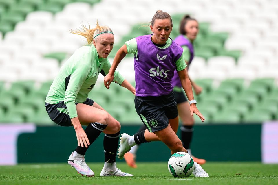 Katie McCabe and Louise Quinn, left, during an Ireland women's training session at the Aviva Stadium in Dublin. Photo by Stephen McCarthy/Sportsfile