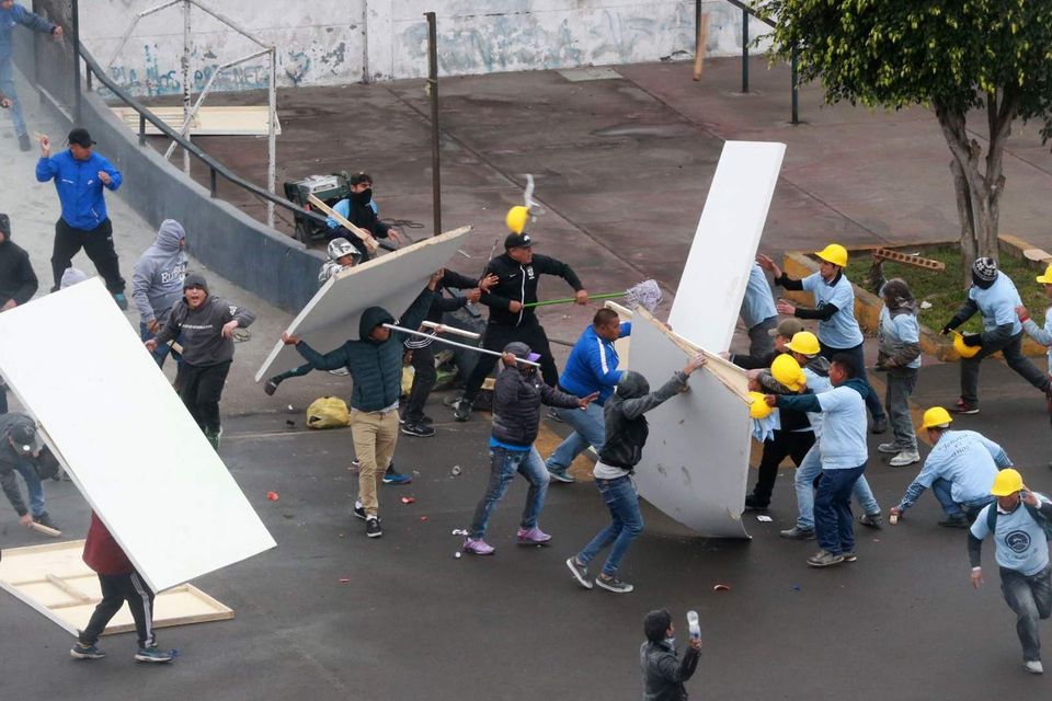 Alianza Lima fans fight with members of an evangelical church (Norman Cordova/Andina News Agency via AP)