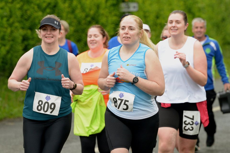 Sinead Edwards and Michelle Geaney, Bweeing Trail Blazers hitting the trail at the Mount Hillary AC 5 Mile Road Race in Banteer. Picture John Tarrant