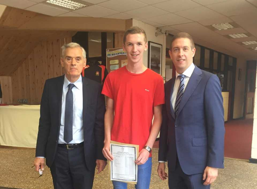 Alex Burke from Cork pictured with outgoing principal Larry Jordan and new principal David Lordan)