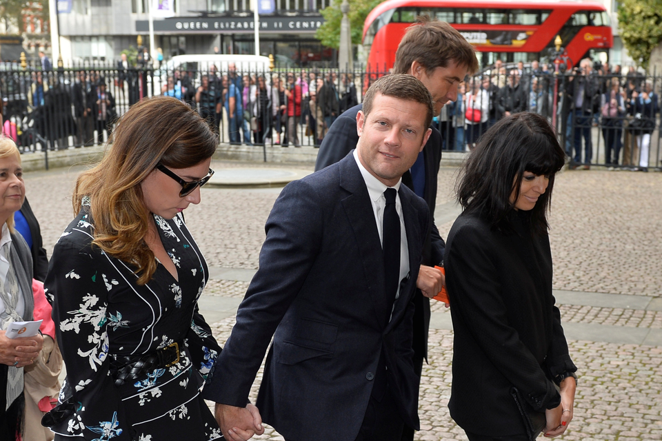 Dermot O'Leary and Claudia Winkleman (right) arrive for the Service of Thanksgiving for Sir Terry Wogan at Westminster Abbey, London. Photo Hannah McKay/PA Wire