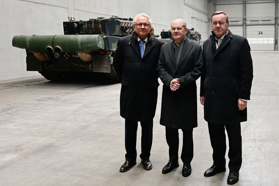 German chancellor Olaf Scholz (centre), defence minister Boris Pistorius (right) and CEO of Rheinmetall, Armin Papperger in Germany. Photo: Getty