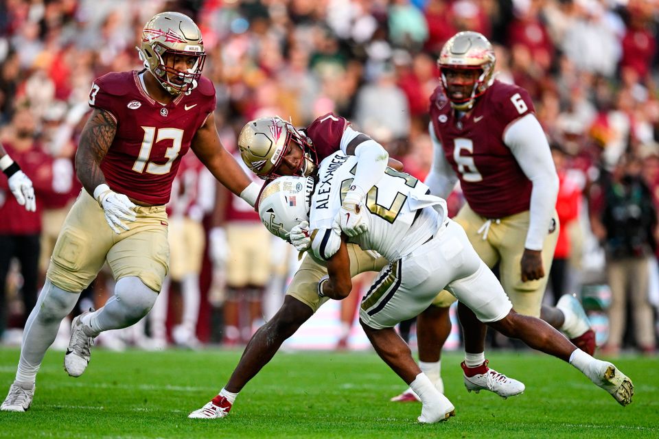 24 August 2024; Georgia Tech Yellow Jackets running back Chad Alexander is tackled by Florida State Seminoles defensive back Shyheim Brown during the 2024 Aer Lingus College Football Classic match between Florida State and Georgia Tech at Aviva Stadium in Dublin. Photo by Brendan Moran/Sportsfile 