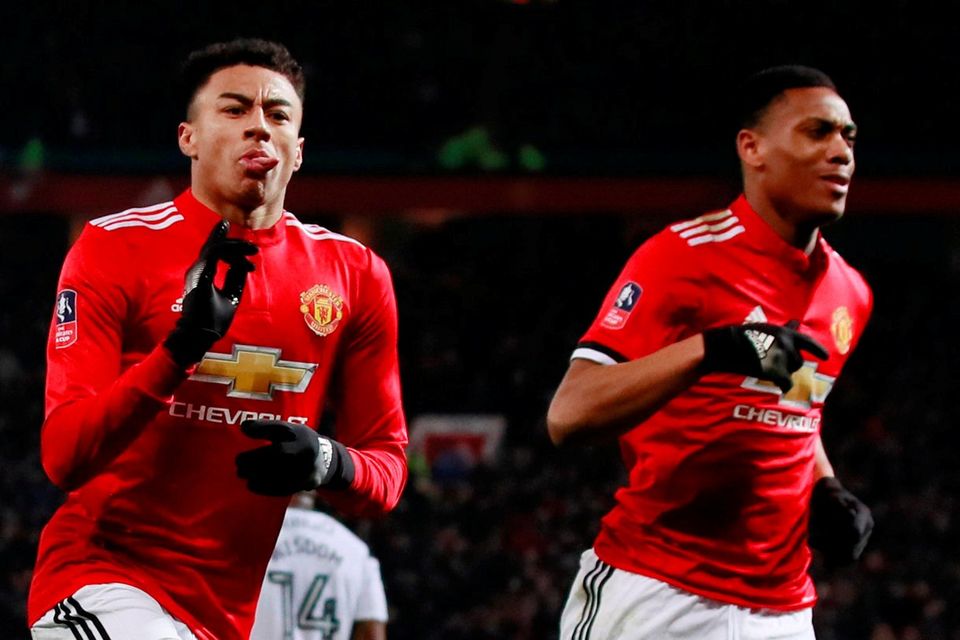 Manchester United's Jesse Lingard celebrates scoring their first goal with Anthony Martial. Action Images via Reuters/Jason Cairnduff