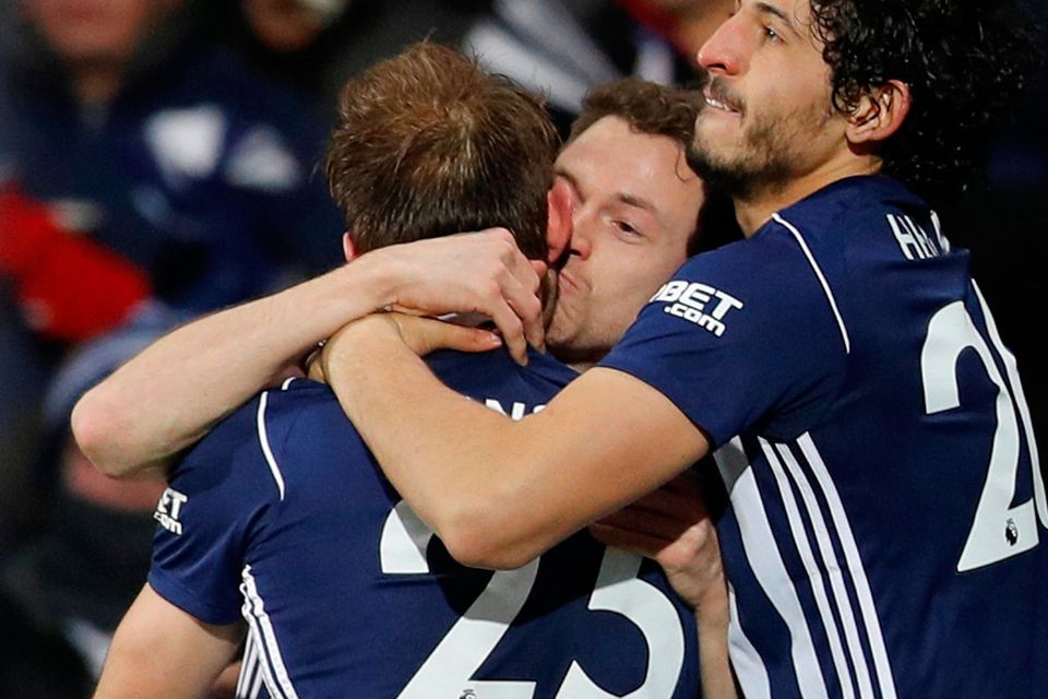 West Bromwich Albion's Craig Dawson celebrates scoring their second goal with Jonny Evans and Ahmed Hegazi