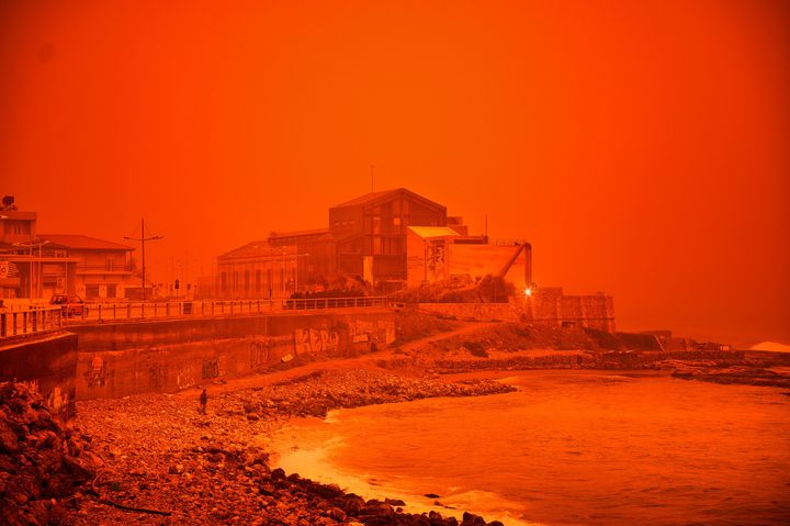 Crete’s skies turn red as Saharan dust cloud and deadly storm hits island