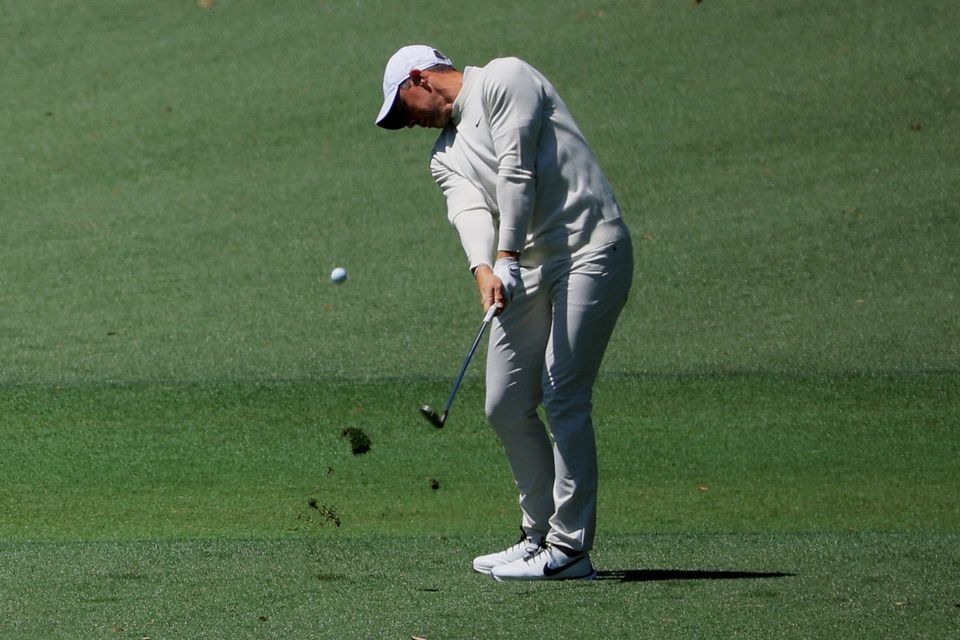 Rory McIlroy hits his approach on the second hole during the second round of The Masters at Augusta National Golf Club