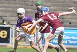 thumbnail: Donal Dwyer of Wexford CBS is outnumbered by FCJ's Jack Quigley and Conor Lacey. Photo: Jim Campbell