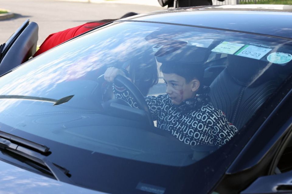 Alejandro tries out the Aston Martin for size.