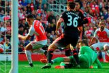 thumbnail: Alexis Sanchez puts Arsenal ahead against Manchester United with a deft flick of his right boot at the Emirates GETTY