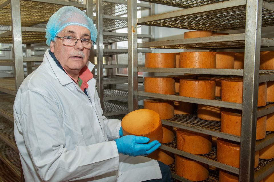 Eamonn Lonergan of Knockanore Farmhouse Cheese working on the smoked variety on his West Waterford farm. Photos: O'Gorman Photography