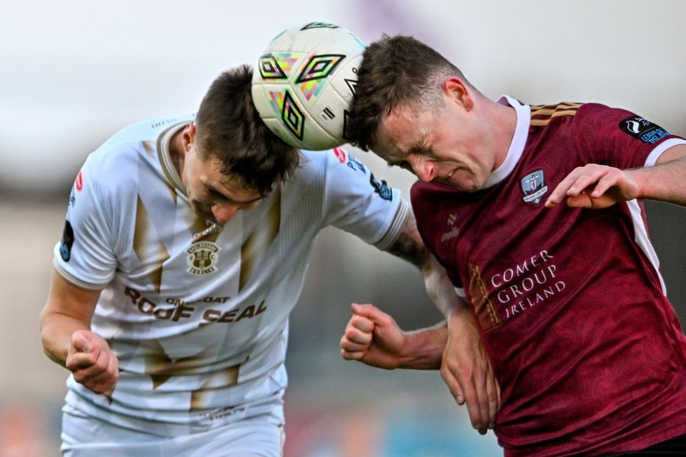 Heads you win: Killian Brouder of Galway United tussles with Seán Boyd of Shelbourne at Eamonn Deacy Park in Galway. Photo by Sam Barnes/Sportsfile
