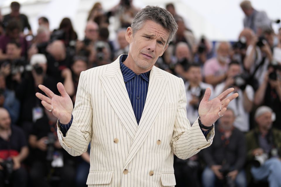 Ethan Hawke poses for photographers at the photo call for the film Strange Way Of Life at the 76th Cannes Film Festival (Scott Garfitt/Invision/AP)