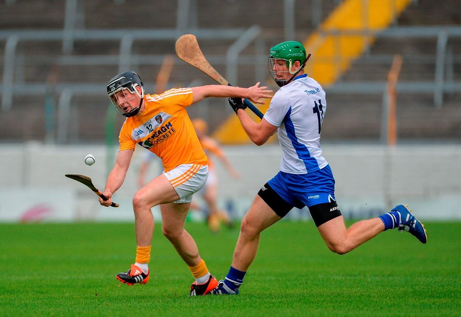 James O'Connell of Antrim in action against Tom Devine. Photo: Sportsfile