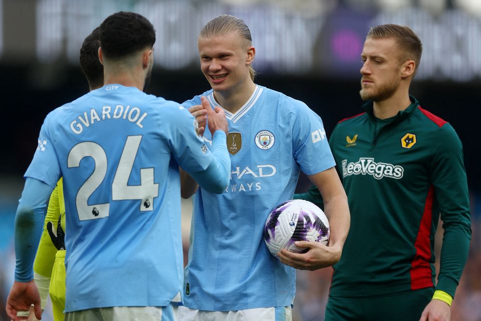 Manchester City's Erling Haaland celebrates with Josko Gvardiol