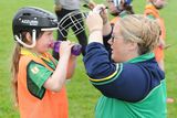 thumbnail: Isabelle O'Sullivan receiving some half-time advice from mum Katie during the Ger Hendrick All Ireland Week in Buffers Alley GAA Grounds on Saturday. Pic: Jim Campbell