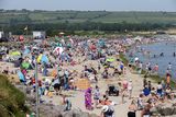 thumbnail: Sun worshippers enjoying the heatwave at Clonea Strand, Dungarvan, County Waterford PIC Tony Gavin