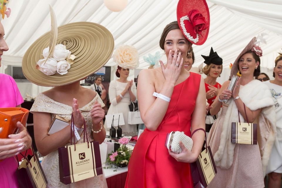 Alex Butler (in red) from Ballyedmond, Midleton, Co .Cork has scooped the coveted title of Kilkenny Best Dressed Lady at the 2015 Galway Races Ladies Day, this year sponsored by the Kilkenny Group