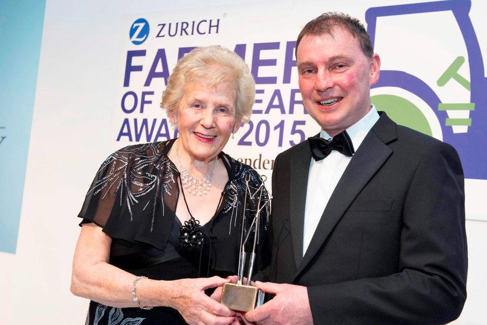 Legend: Anna May McHugh, president of the National
Ploughing Association, receives her Lifetime Achievement
award from ICMSA president John Comer