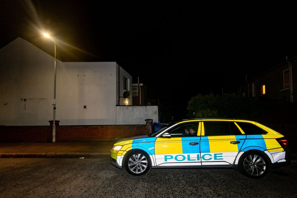 Police at the scene on Melrose Street, south Belfast. Credit: Kevin Scott for Belfast Telegraph