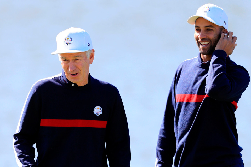 John McEnroe and James Blake during the Ryder Cup Celebrity Match at Le Golf National. Photo: PA