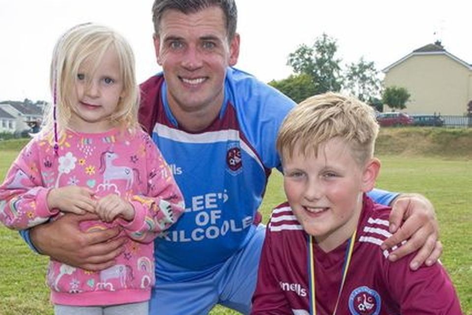 Matthew Kennedy with Sophie and Olly after St. Anthony's won the Thomas Scott Cup last year.