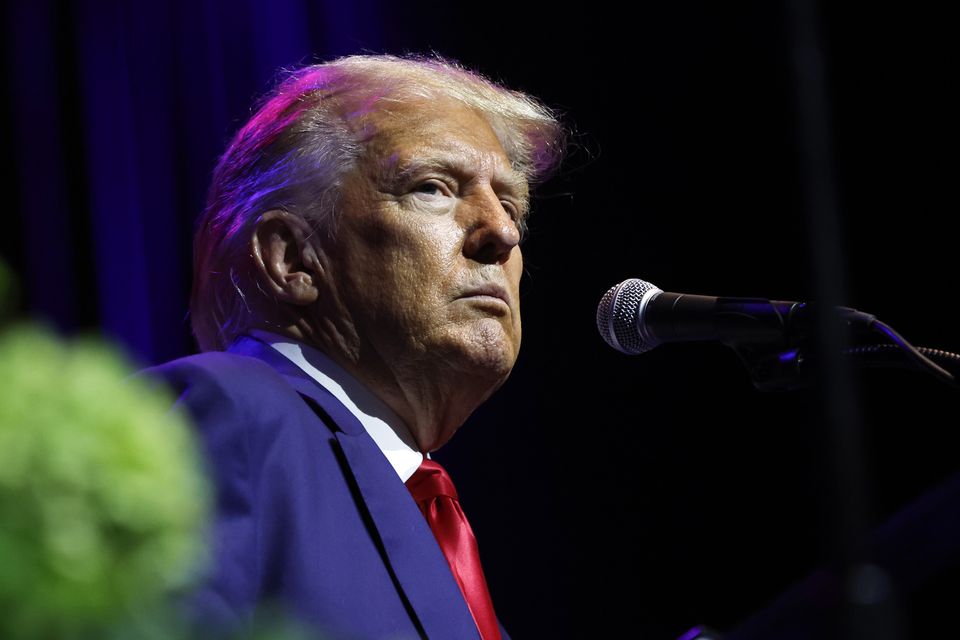 Former US president Donald Trump has been indicted in Georgia with scheming to overturn his 2020 election loss in the state (AP Photo/Butch Dill)