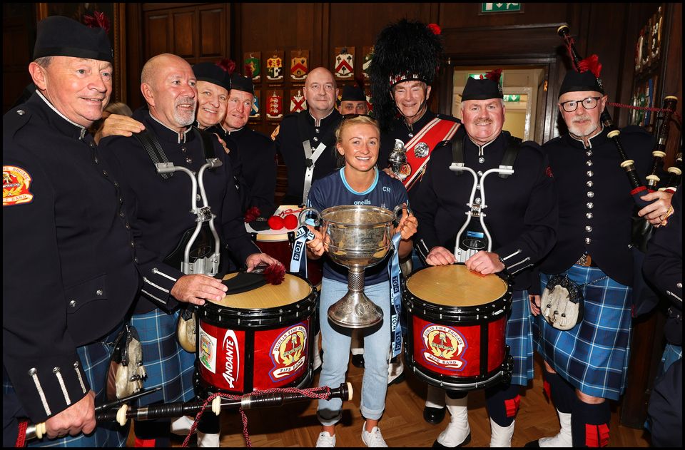 Dublin All Ireland Ladies Team Captain Carla Rowe and her team are welcomed to the Mansion House after their win this weekend by the Dublin Fire Brigade Pipe Band. Picture: Steve Humphreys