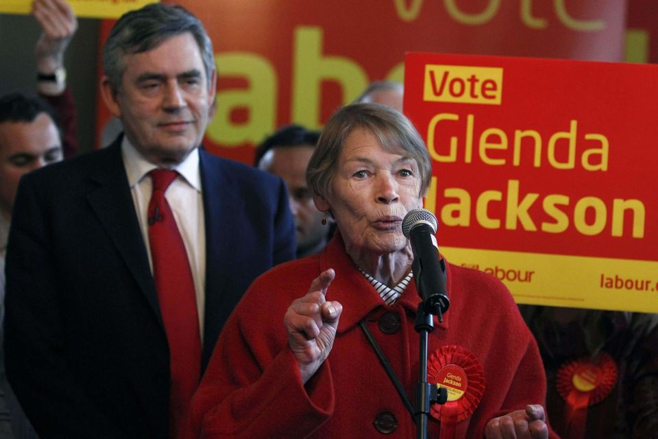 Prime Minister Gordon Brown listens during a speech by Glenda Jackson in 2010 (PA)